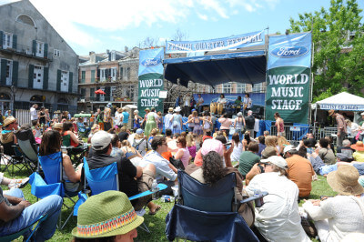 One of many neighborhood stages at French Quarter Festival, bringing in locals and tourists to enjoy some of the best music in the region. (Photo: Paul Broussard)